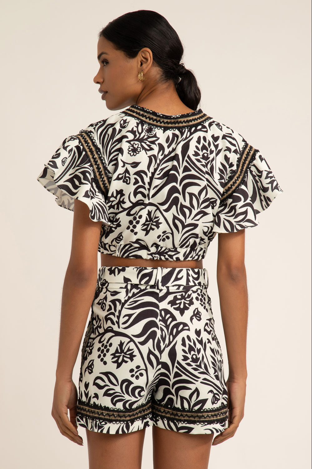 Top cropped amarração tropical gráfico off white