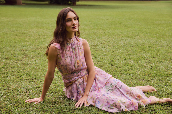 IN HER GARDEN