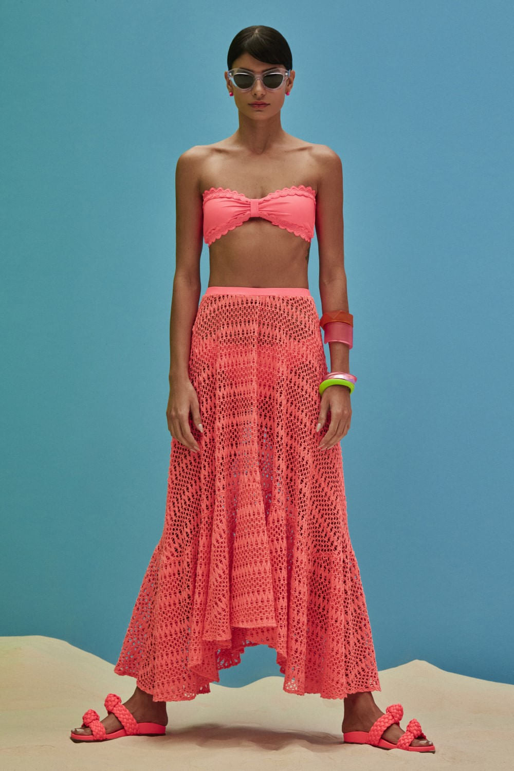SAIA LONGA ASSIMÉTRICA TELA NEON VIBES CORAL