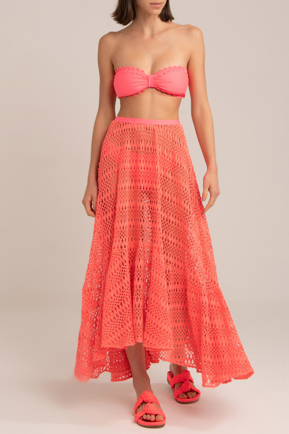 SAIA LONGA ASSIMÉTRICA TELA NEON VIBES CORAL