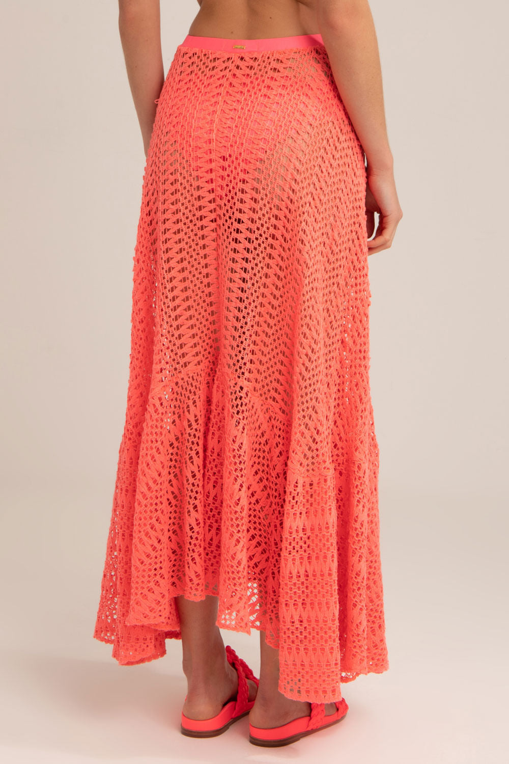 SAIA LONGA ASSIMÉTRICA TELA NEON VIBES CORAL